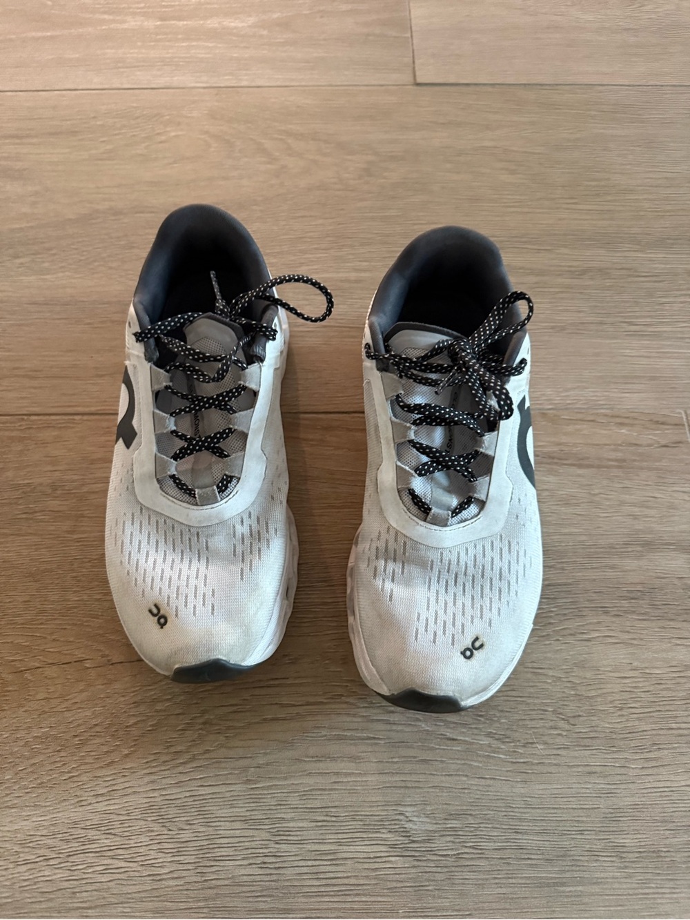 On Running Light Gray and Black Women's Athletic Shoes